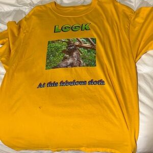 Sloth shirt with light wear. Still funny size XL
